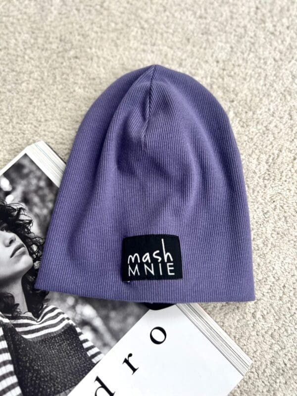 Vaikiška violetinės spalvos kepurė