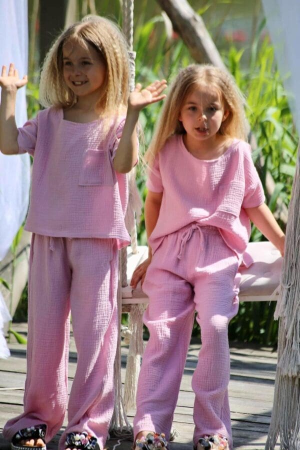 Rožinės spalvos kostiumėlis